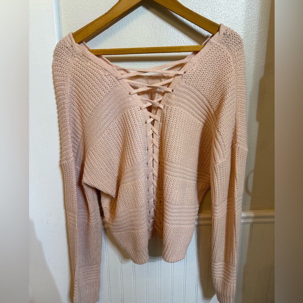 Chic V-Neck Sweater with Lace-Up Detail